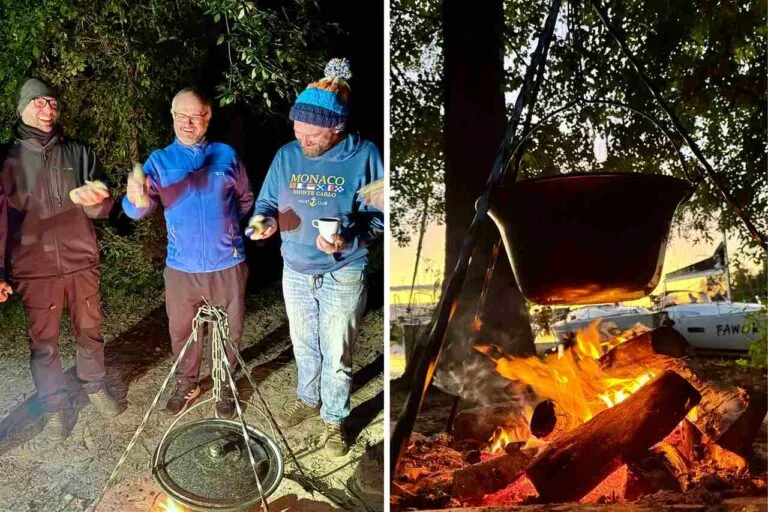 ognisko i kociołek na Mazurach. Załoga ogrzewa się przy ognisku.