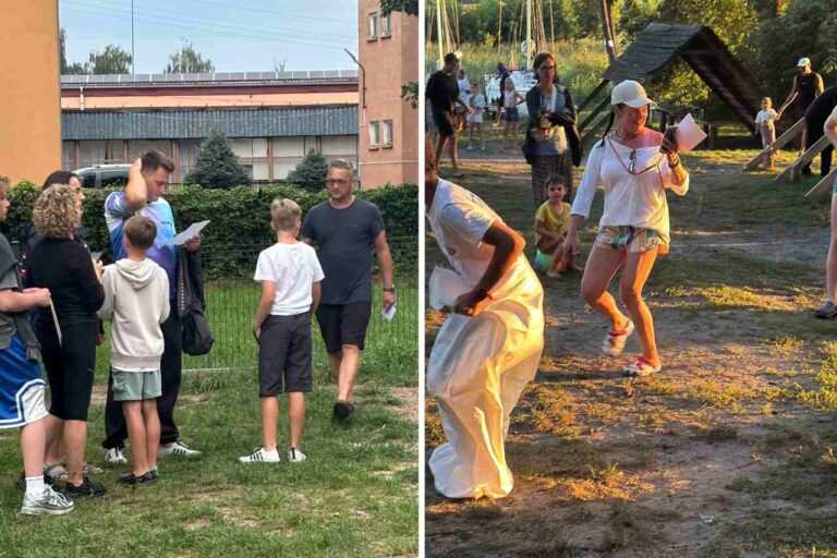 Rodziny wykonujące zadania w grze Skarb Galindów podczas rejsu Tata na Mazury
